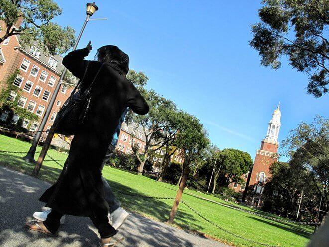Students are walking through the campus at Brooklyn College.