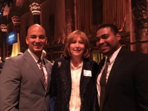 Juan takes a snapshot with Ann Tisch and Jon Roure