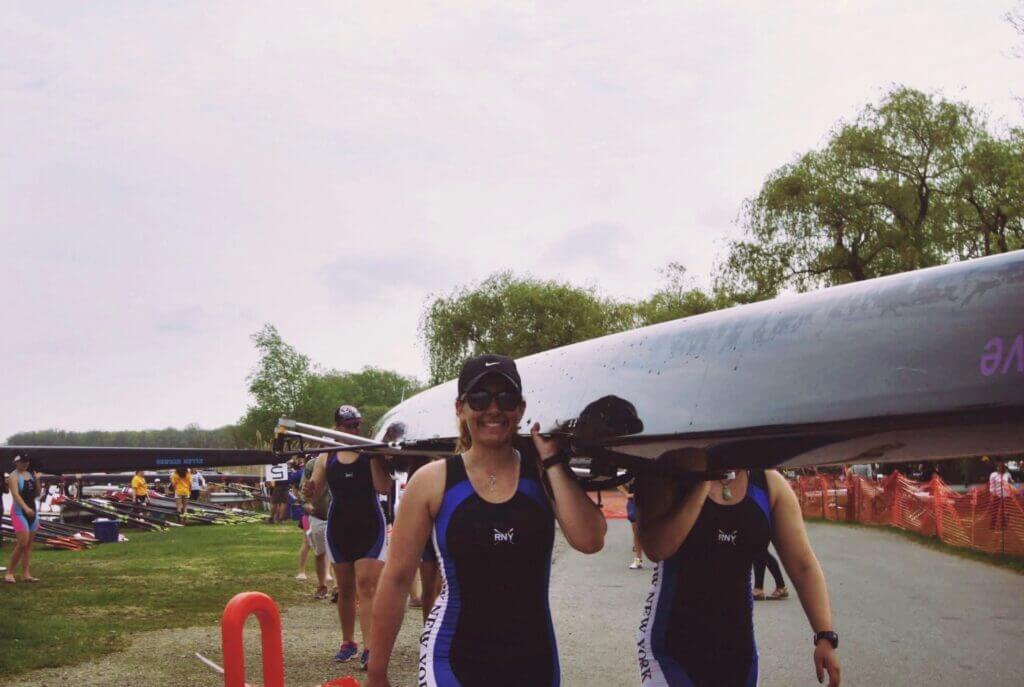 Nicole has been involved with Row New York since middle school and this photo shows her back in the day, carrying a row boat.