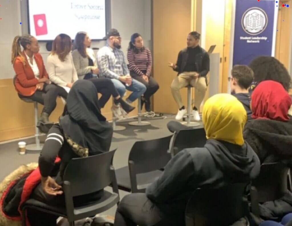 Mark Sanders facilitates a panel discussion at the first Future Success Symposium.