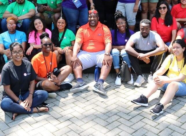 CBI staff, students and partners take a group photo at CBSI. 