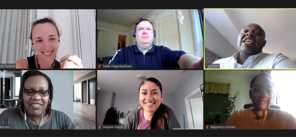 Dora and breakout group talk on a Zoom conference call.