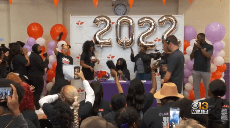 Students from Class of 2022 celebrate college signing day.