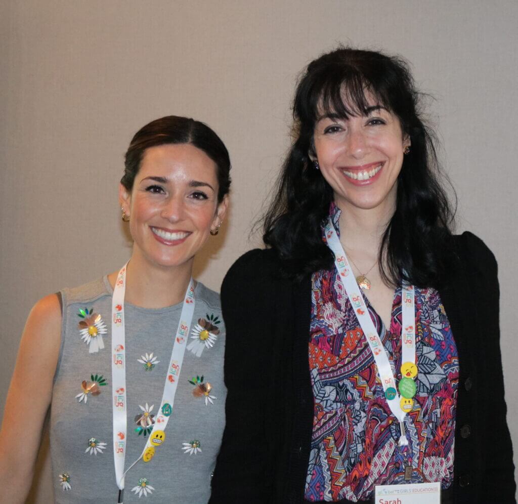 Cait Griffith and Sarah Boldin pause for a picture in between learning and presenting. 