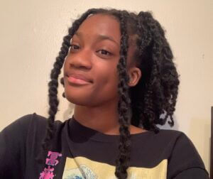 Victoria smiles for a selfie. 