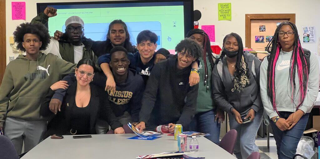 Maria with a group of students who attended a college and career info session.