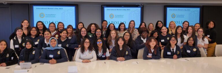 TYWLS Astoria students and volunteers at Apollo Global Management pose for a group photo