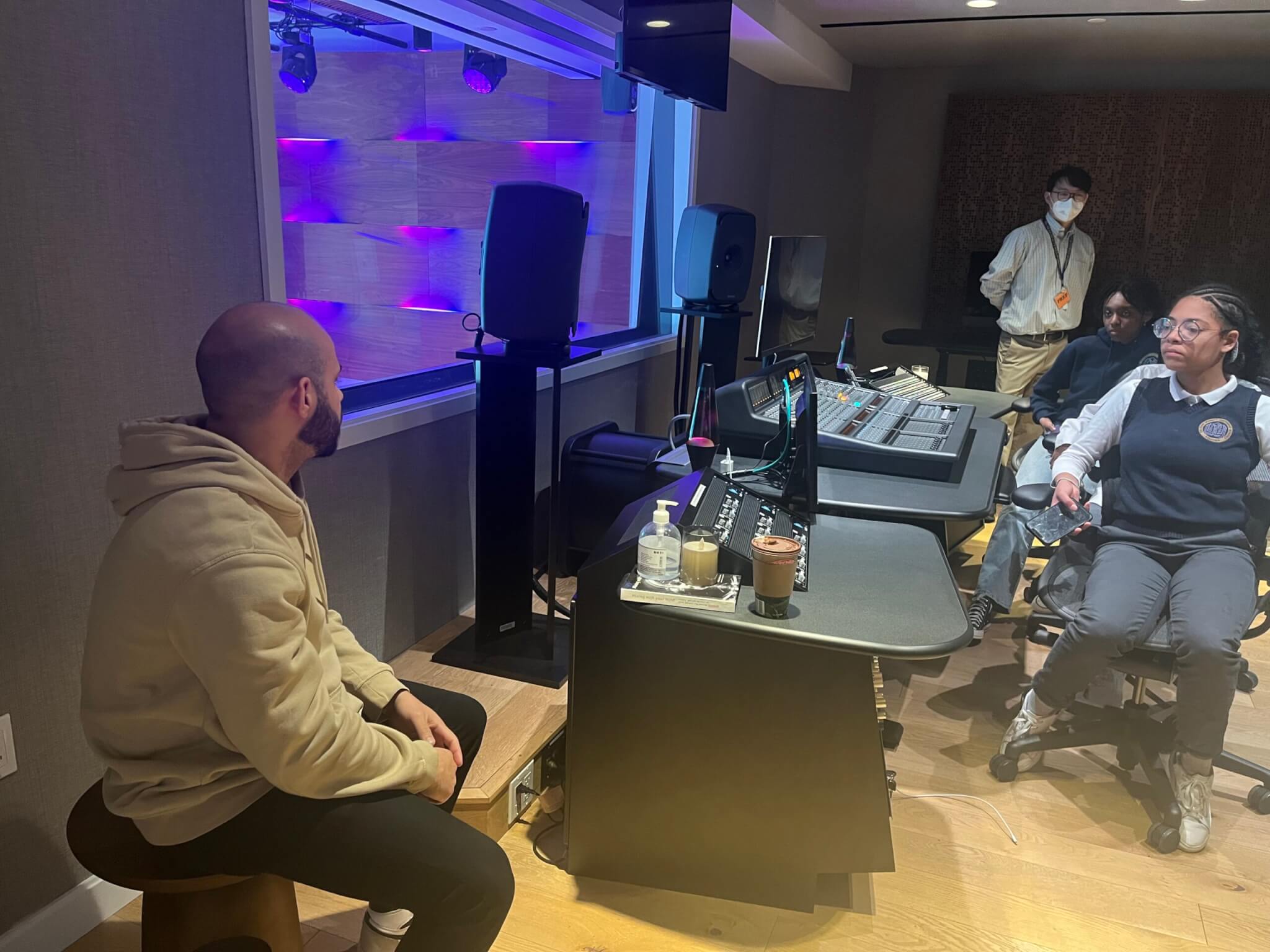 SONY employee speaks to students about the music recording process.