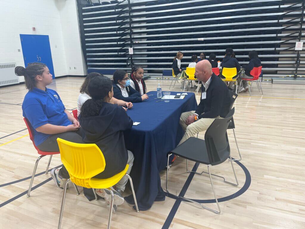 Students have the opportunity to ask volunteers questions about their careers.