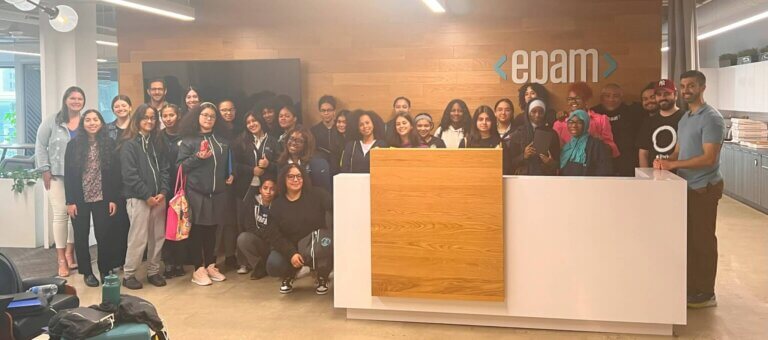Group of TYWLS students pose in EPAM's reception area.