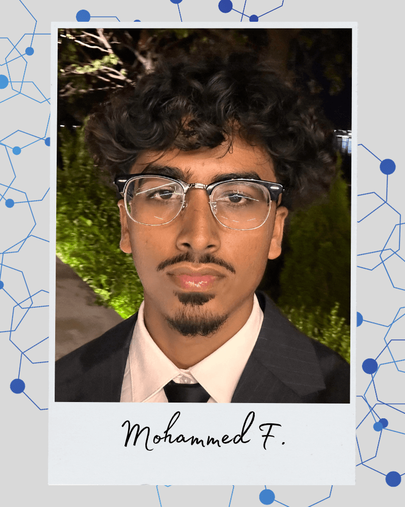 College student wearing glasses and a suit