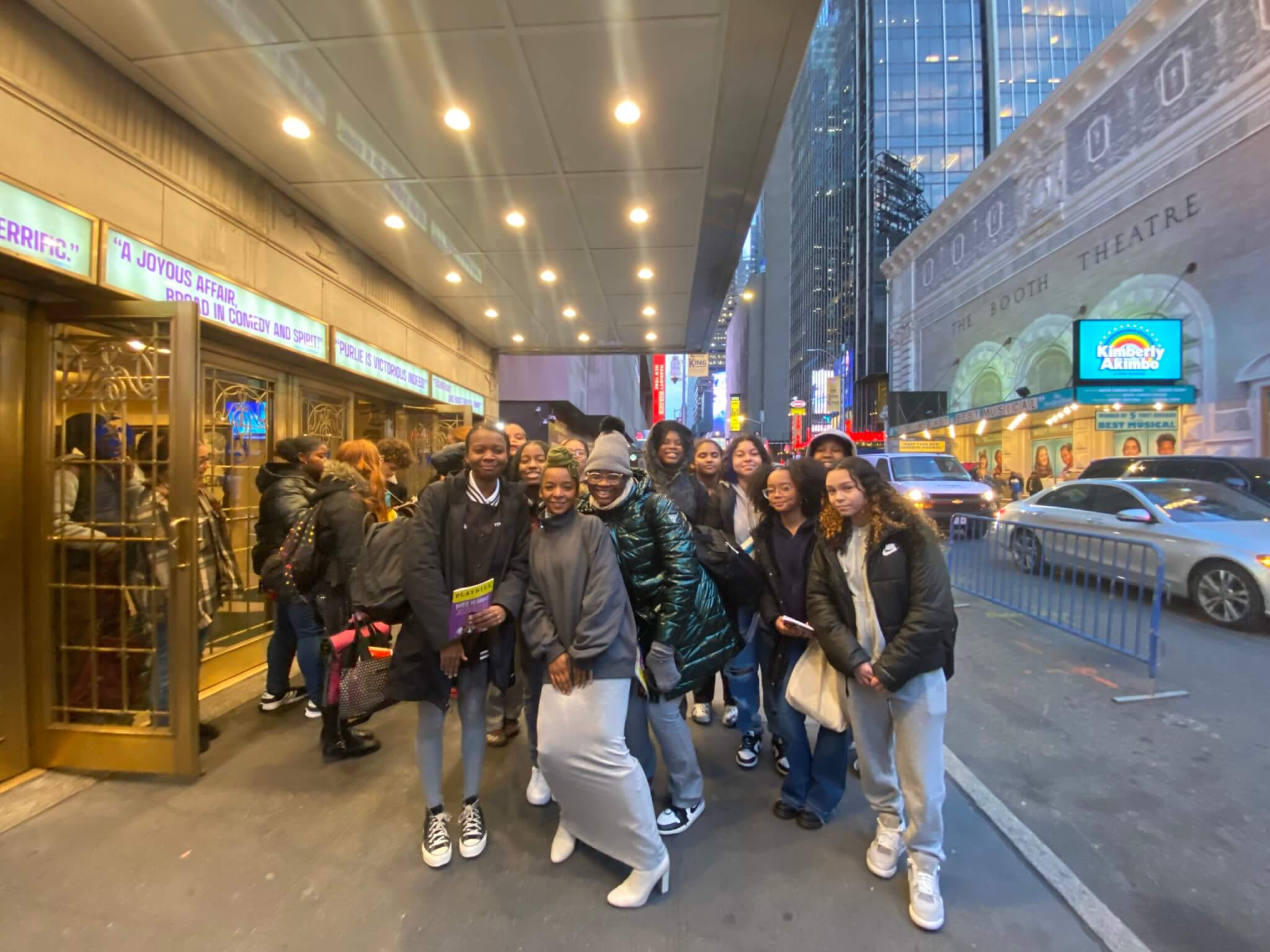 Broadway actor Kara Young poses for photo with students outside theater
