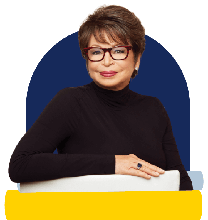 Figure of Valerie Jarrett with arm resting on podium top