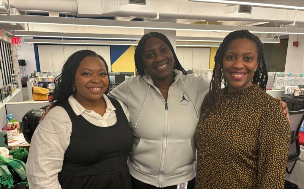 The three members of the Alumni Engagement Team pose for a photo