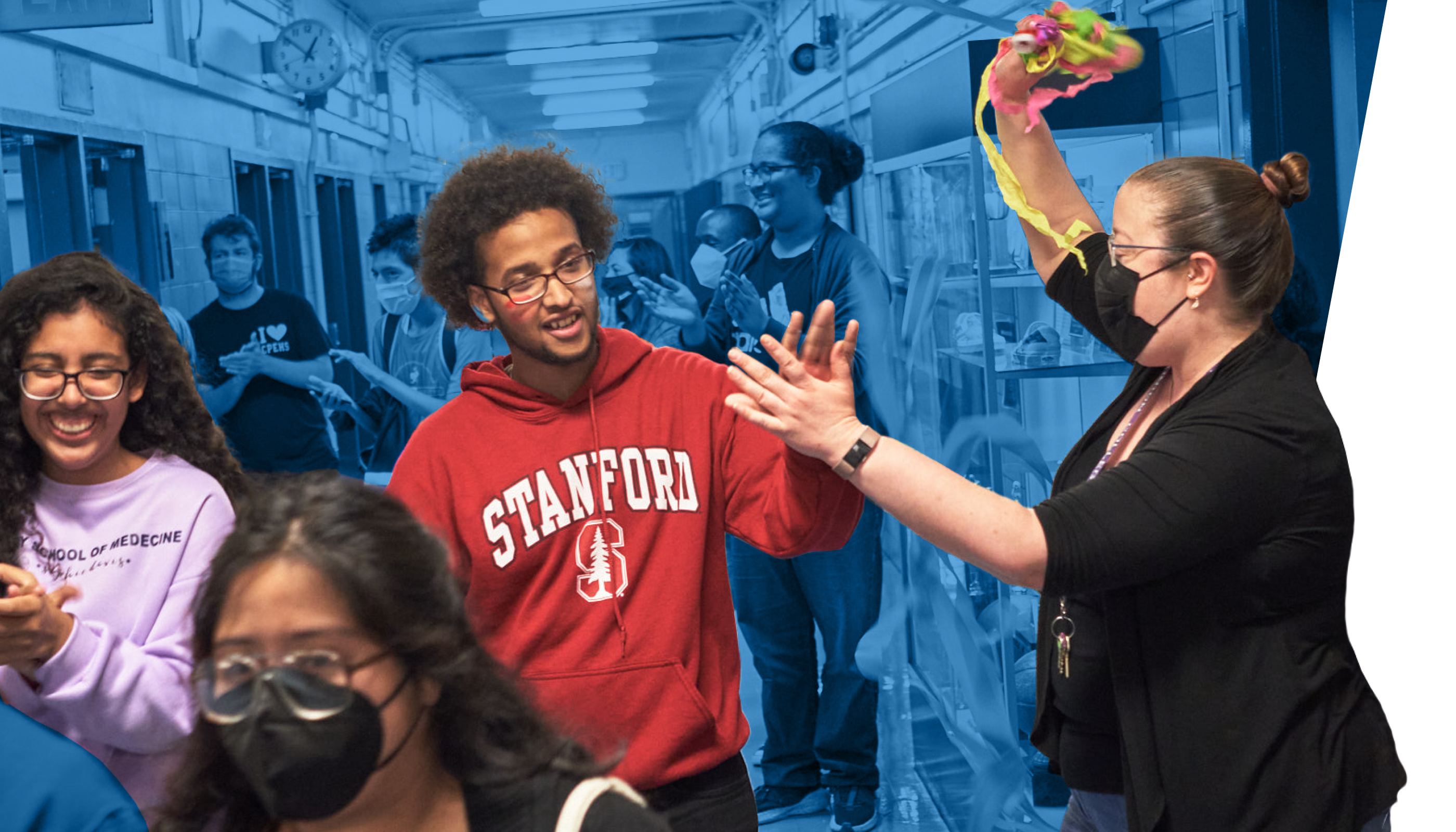 Student giving teacher high five.