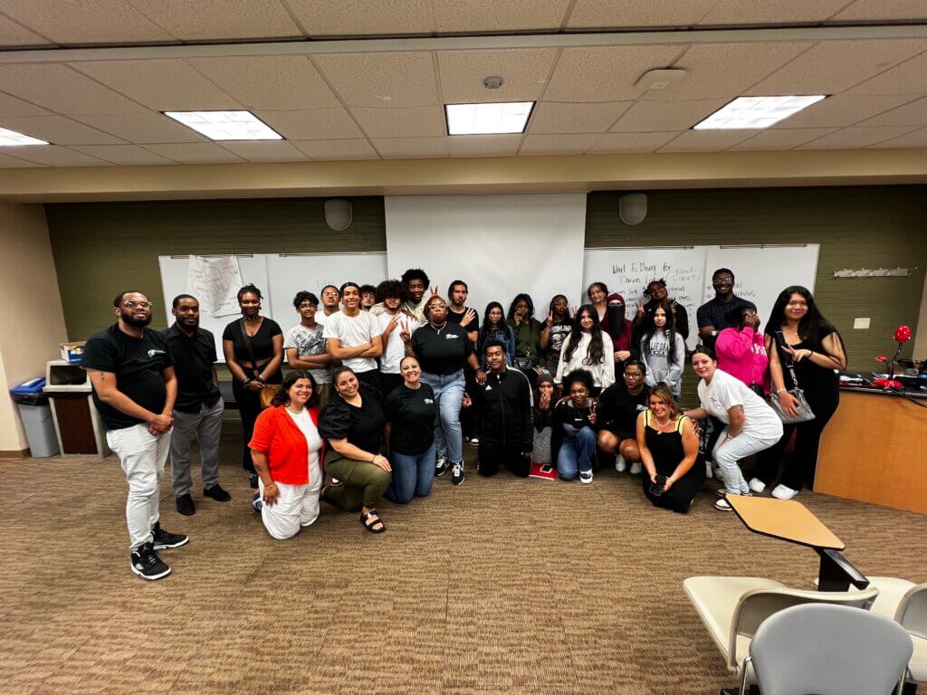 Students and staff from our Buffalo team gather for a photo in the classroom