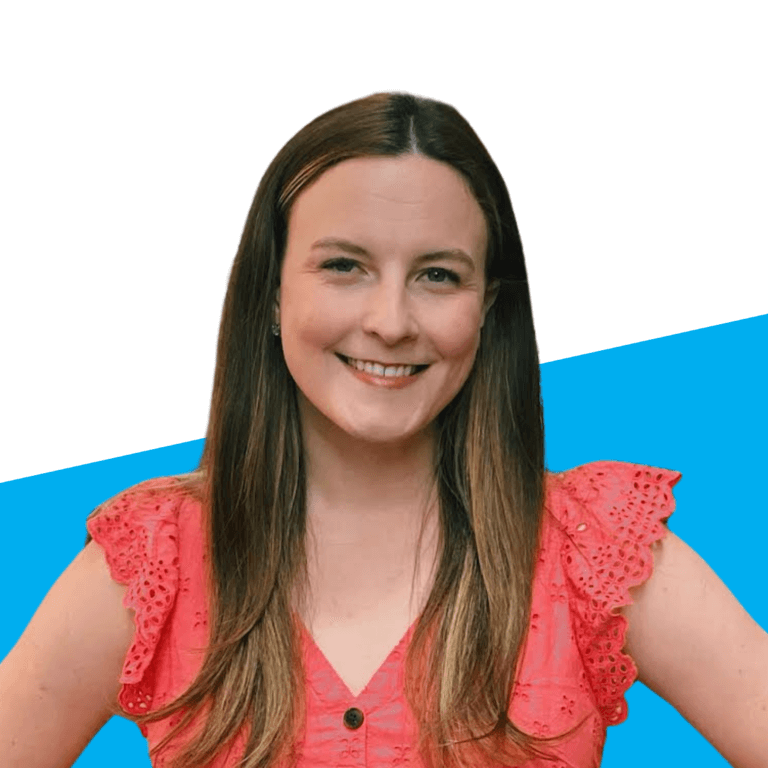 staff headshot of woman with dark blonde hair, wearing a pink shirt with ruffled sleeves
