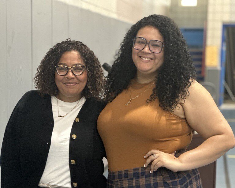 Two directors of college counseling pose for a photo