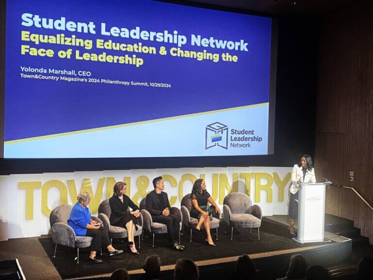 Student Leadership Network's CEO Yolonda Marshall speaks on stage at the Town & Country Philanthropy Summit