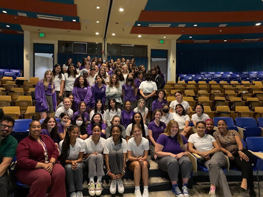 GALA students pose together in the GALA auditorium.