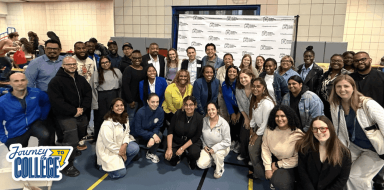college admissions reps and counselors pose for photo in front of CollegeBound Initiative step and repeat banner
