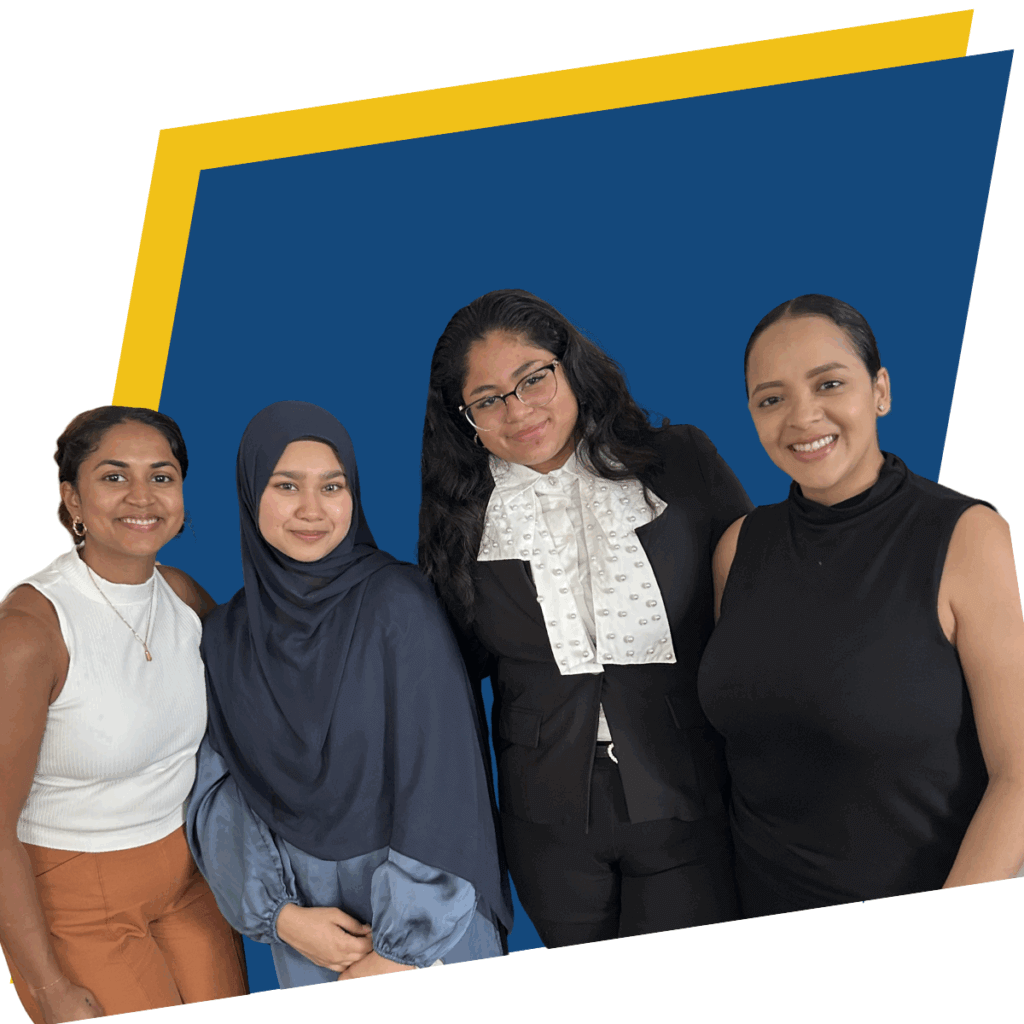 Four women stand side by side, smiling, in front of a blue background with a yellow border.